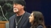 FILE - Former professional wrestler Hulk Hogan, left, stands with attorney Seema Ghatnekar, in a courtroom in St. Petersburg, Fla., March 18, 2016. A jury awarded Hogan $115 million in an invasion of privacy case against Gawker Media.