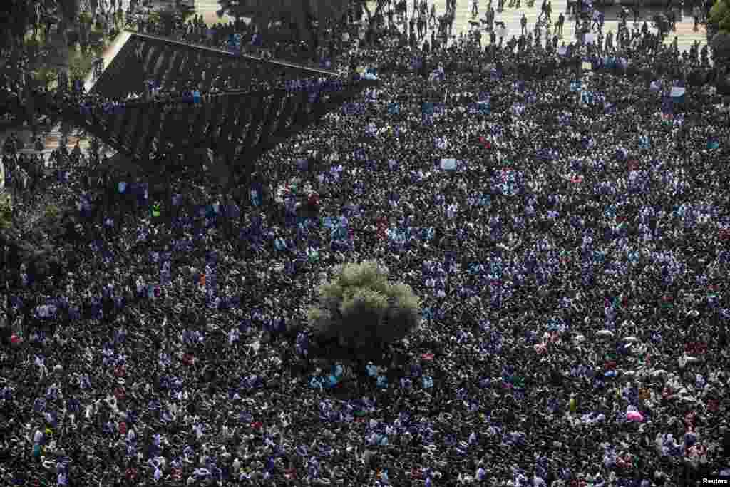 Imigrantes africanos protestam na Praça Rabin em Tel Aviv, Jan. 5, 2014. 