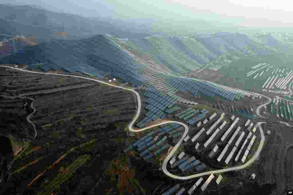 A solar panel installation is seen in Ruicheng County in central China&#39;s Shanxi Province.