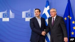 Grčki premijer Aleksis Cipras i predsednik Evropske komisije Žan-Klod Junker prilikom ranijeg susreta u Briselu, 4. februara 2015. 