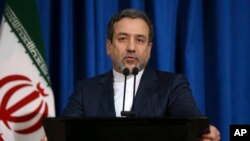 FILE - Iran's Deputy Foreign Minister Abbas Araghchi, who is also a senior nuclear negotiator, speaks with media in his press conference in Tehran, Iran, Jan. 15, 2017. 