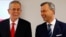 Austrian presidential candidates Alexander Van der Bellen, left, who is running as an independent, and Norbert Hofer, who represents the far-right, pose for photographers before a TV debate in Vienna, Austria, Dec. 1, 2016. 