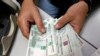 Rubla ruse bie me 30 për qind pas sanksioneve të perëndimit 