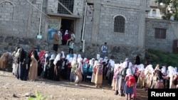 Students gather for a morning drills outside of the teacher's house, who turned it into a makeshift free school that hosts 700 students, in Taiz, Yemen October 18, 2018.