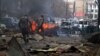 FILE - Paramilitary soldiers visit an area hit by a bomb attack, claimed by a Taliban splinter group, in Quetta, Pakistan, March 14, 2014.