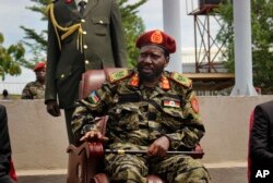 FILE - South Sudan's President Salva Kiir attends a ceremony marking the 34th anniversary of the Sudan People's Liberation Army (SPLA) in the capital Juba, South Sudan, May 18, 2017.