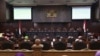 FILE - Judges read their verdict on the case of a petition seeking to make gay sex and sex outside marriage illegal during a hearing at the Constitutional Court in Jakarta, Indonesia, Dec. 14, 2017.