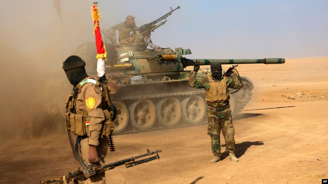 Para tentara milisi Syiah yang dikenal sebagai Satuan Mobilisasi Rakyat, PMF dalam pertempuran melawan ISIS di pinggiran Mosul (foto: dok).