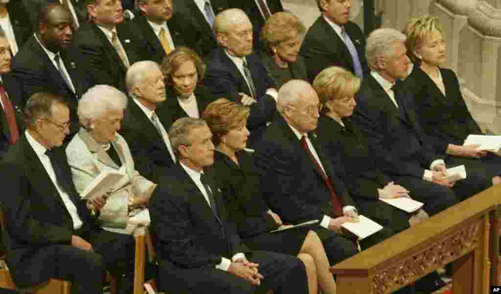 Former President George W. Bush sits with former presidents and their wives during funeral services at the National Cathedral in Washington on June 10, 2004 for former President Ronald Reagan.