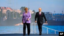 Канцлер Німеччини Анґела Меркель і президент Росії Володимир Путін