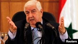 Syria's Foreign Minister Walid al-Muallem speaks during a news conference in Damascus, Syria, Aug. 27, 2013.