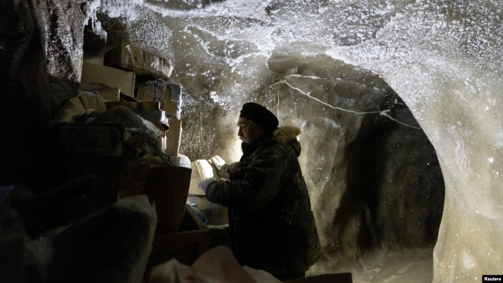 Sergey Zimov, 66, a scientist who works at Russia's Northeast Science Station, checks materials stored underground in the permafrost at the Pleistocene Park outside the town of Chersky, Sakha (Yakutia) Republic, Russia, September 13, 2021. (REUTERS/Maxim Shemetov/File Photo)