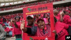 FILE - Supporters of Economic Freedom Fighters leader Julius Malema welcome him upon his arrival at Moses Mabhida Stadium in KwaZulu Natal province, South Africa, February 10, 2024.