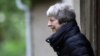 Britain's Prime Minister Theresa May leaves church near High Wycombe, April 28, 2019. May is under pressure to reverse a decision to allow the Chinese technology giant Huawei a role in building parts of Britain's 5G mobile network.