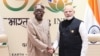 Perdana Menteri India Narendra Modi (kanan) dan Presiden Nigeria Bola Ahmed Tinubu berjabat tangan selama pertemuan bilateral setelah sesi penutupan KTT G20 di New Delhi pada 10 September 2023. (Foto: AFP)