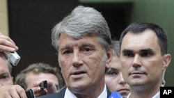 Former Ukrainian President Viktor Yushchenko speaks to the media after he testified against his 2004 Orange Revolution partner, ex-premier Yulia Tymoshenko, in her abuse of office trial in central Kyiv, Ukraine, August 17, 2011