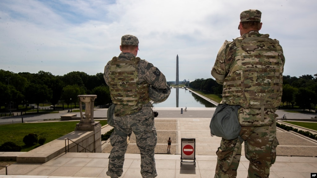 Members of the District of Columbia Army National Guard stand guard at the Lincoln Memorial in Washington, June 3, 2020, securing the area as protests continue following the death of George Floyd.