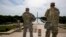 Members of the District of Columbia Army National Guard stand guard at the Lincoln Memorial in Washington, June 3, 2020, securing the area as protests continue following the death of George Floyd.