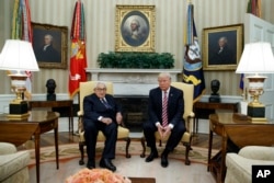 Presidente Donald Trump y exsecretario de estado Henry Kissinger.