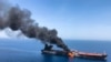 An oil tanker is on fire in the sea of Oman, June 13, 2019. Two oil tankers near the Strait of Hormuz were reportedly attacked Thursday, an assault that left one ablaze and adrift as sailors were evacuated from both vessels.