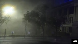 Wind-driven rain soaks a street in downtown Tampa, Fla., during the passage of Hurricane Milton, Oct. 9, 2024.