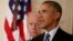 President Barack Obama, standing with Vice President Joe Biden, delivers remarks in the East Room of the White House in Washington, July 14, 2015, after an Iran deal is reached. 