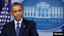 U.S. President Barack Obama pauses while speaking about the continuing government shutdown from the White House Briefing Room in Washington, Oct. 8, 2013. 