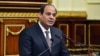 In this photo provided by Egypt's state news agency MENA, Egyptian President Abdel-Fattah el-Sissi, addresses parliament in Cairo, Feb. 13, 2016. 