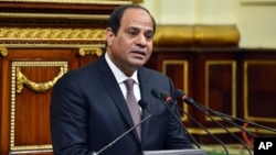 FILE - In this photo provided by Egypt's state news agency MENA, Egyptian President Abdel-Fattah el-Sissi, addresses parliament in Cairo, Feb. 13, 2016. He was recently listed in an eBay acution