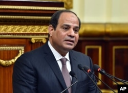 FILE - In this photo provided by Egypt's state news agency MENA, Egyptian President Abdel Fattah el-Sissi addresses parliament in Cairo, Feb. 13, 2016.