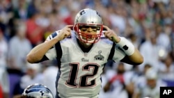 FILE - New England Patriots quarterback Tom Brady calls a play against the Seattle Seahawks during the first half of Super Bowl XLIX in Glendale, Arizona, Feb. 1, 2015.