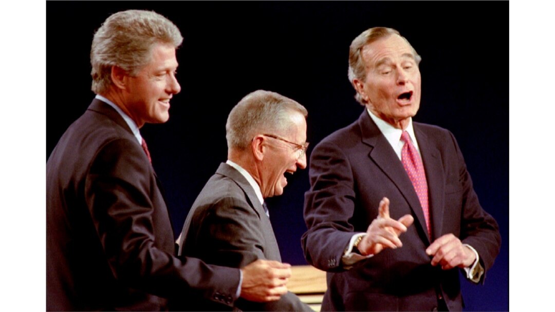 Independent Ross Perot (C) seen here with Democratic Presidential nominee Governor Bill Clinton (L) and President George Bush at the 1992 presidential debate in Michigan, went on to win 19% of the popular vote in the November 1992 election.