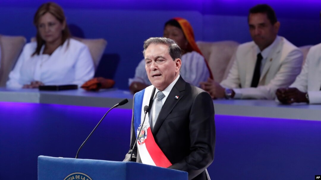 Panama's new President Laurentino Cortizo wears the presidential sash as he speaks during his inauguration ceremony in Panama City, July 1, 2019.