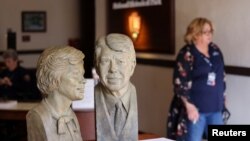 FILE - Busts of Rosalynn and Jimmy Carter are displayed in the entryway of the Jimmy Carter National Historic Center after the death at age 96 of former U.S. first lady Rosalynn Carter, wife of former U.S. President Jimmy Carter, in Plains, Georgia, U.S., November 20, 2023.