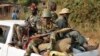 Des miliciens du groupe armé issu de l'ex-rébellion de la Séléka, à Bangui, RCA, le 27 janvier 2014.