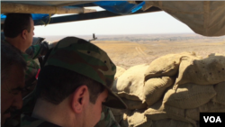 Borci Pešmerga na liniji fronta izmedju Kurda i ISIS-a istočno od Mosula