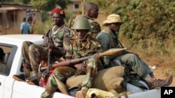 Des miliciens du groupe armé issu de l'ex-rébellion de la Séléka, à Bangui, RCA, le 27 janvier 2014.