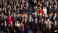 Members of the 113th U.S. Congress take the oath of office in the House of Representatives chamber on Capitol Hill in Washington, Thursday, Jan. 3, 2013.