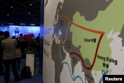 A map illustrating China's silk road economic belt and the 21st century maritime silk road, or the so-called "One Belt, One Road" megaproject, is displayed at the Asian Financial Forum in Hong Kong, China, Jan. 18, 2016.