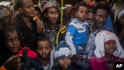 Migrants subsahariens à bord du navire de sauvetage de l'ONG espagnole Proactiva Open Arms, au port de Pozzallo, en Sicile, en Italie le 19 janvier 2018.