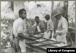 Cooking a fried supper as a benefit picnic church supper in Bardstown, Kentucky, in August of 1940.