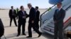 U.S. Ambassador to Jordan Stuart Jones greets U.S. Secretary of State John Kerry upon his arrival in Amman, Jordan, on November 7, 2013, for talks focused on Middle East issues.