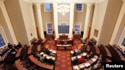 North Carolina Electors rehearse for tomorrow's electoral college vote in the North Carolina State Capitol building in Raleigh, North Carolina, U.S., December 18, 2016.