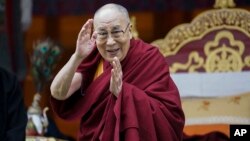 Tibetan spiritual leader the Dalai Lama greets devotees at the Buddha Park in Bomdila, Arunachal Pradesh, India, April 5, 2017. 