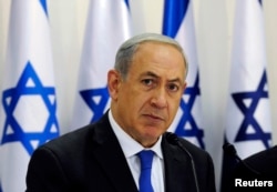 Israel's Prime Minister Benjamin Netanyahu heads a special cabinet meeting in Sde Boker in southern Israel, Nov. 10, 2013.