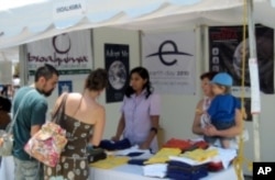 Locals in Guadalajara, Mexico learn about the history of Earth Day at the Earth Day Network/Bioalkimia booth during Dia De La Tierra 2010, organized by Bioalkimia and sponsored by Earth Day Network.