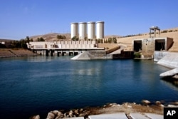 FILE - A general view of the dam in Mosul, 360 kilometers (225 miles) northwest of Baghdad, Iraq.