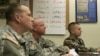 Army Pfc. Jonathan Bluhm, Pfc. Andrew Mashburn, and Pfc. Jacob Delacerda, from left, listen during an Arabic class at the Foreign Language Training Center at Fort Lewis, Washington, August 2006. (file photo) 