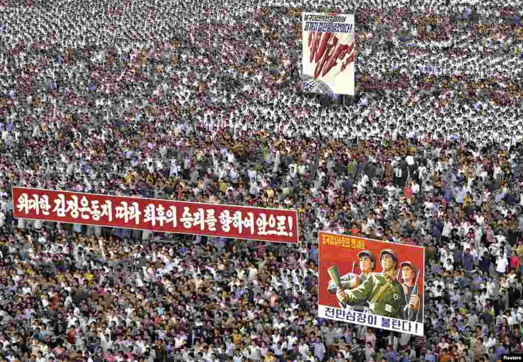 North Koreans attend a mass rally against &quot;U.S. Imperialists&quot; at Kim Il Sung Square in Pyongyang in this undated photo released by North Korea&#39;s Korean Central News Agency (KCNA). 