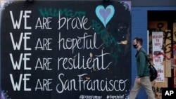 12일 미국 샌프란시스코 거리에 신종 코로나바이러스 사태를 함께 이겨내기 위한 응원 문구가 쓰여있다.